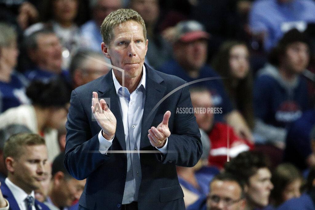 John Locher FILE - In this March 10, 2020, file photo, Gonzaga head coach Mark Few motions toward the court in the second half of an NCAA college basketball game against Saint Mary's in the final of the West Coast Conference men's tournament in Las Vegas. Gonzaga and Baylor remained Nos. 1-2 in the first Associated Press men’s college basketball poll of the regular season released Monday, Nov. 30, 2020. (AP Photo/John Locher, File)
