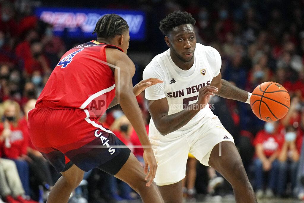 Rick Scuteri Arizona State guard Jay Heath (5) drives on Arizona guard Dalen Terry during the first half of an NCAA college basketball game, Saturday, Jan. 29, 2022, in Tucson, Ariz. (AP Photo/Rick Scuteri)