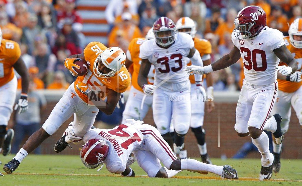 Wade Payne Tennessee wide receiver Jauan Jennings (15) is hit by Alabama defensive back Deionte Thompson (14) in the first half of an NCAA college football game Saturday, Oct. 20, 2018, in Knoxville, Tenn. (AP Photo/Wade Payne)