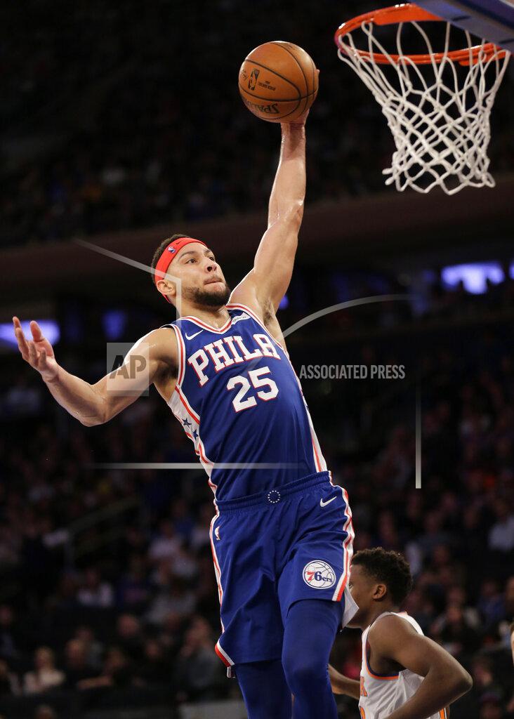 Seth Wenig Philadelphia 76ers' Ben Simmons jumps to the basket during the first half of an NBA basketball game against the New York Knicks, Sunday, Jan. 13, 2019, in New York. (AP Photo/Seth Wenig)