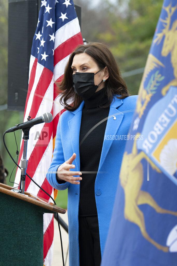 Lon Horwedel Michigan Governor Gretchen Whitmer U.S. talks about the statewide COVID-19 vaccination effort during a press conference outside the Eastern Michigan University Convocation Center, which was hosting a vaccination clinic, Monday, April 12, 2021. (Lon Horwedel/Detroit News via AP)