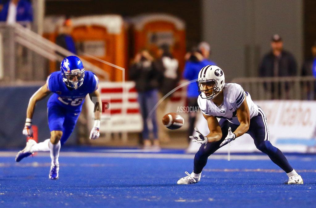 Steve Conner BYU wide receiver Neil Pau'u (84) makes a reception against Boise State during the first half of an NCAA college football game Saturday, Nov. 3, 2018, in Boise, Idaho. (AP Photo/Steve Conner)