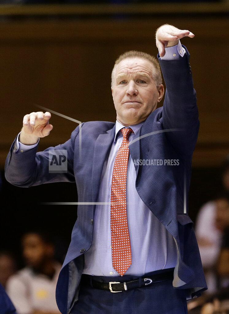 FILE - In this Feb. 2, 2019, file photo, St. John's head coach Chris Mullin directs his players during the first half of an NCAA college basketball game against Duke, in Durham, N.C. Mullin felt in his heart that it was time to move on from St. John’s. Mullin stepped down as coach of the school he starred at as a player in the 1980s earlier this month after four years on the job. (AP Photo/Gerry Broome, File)