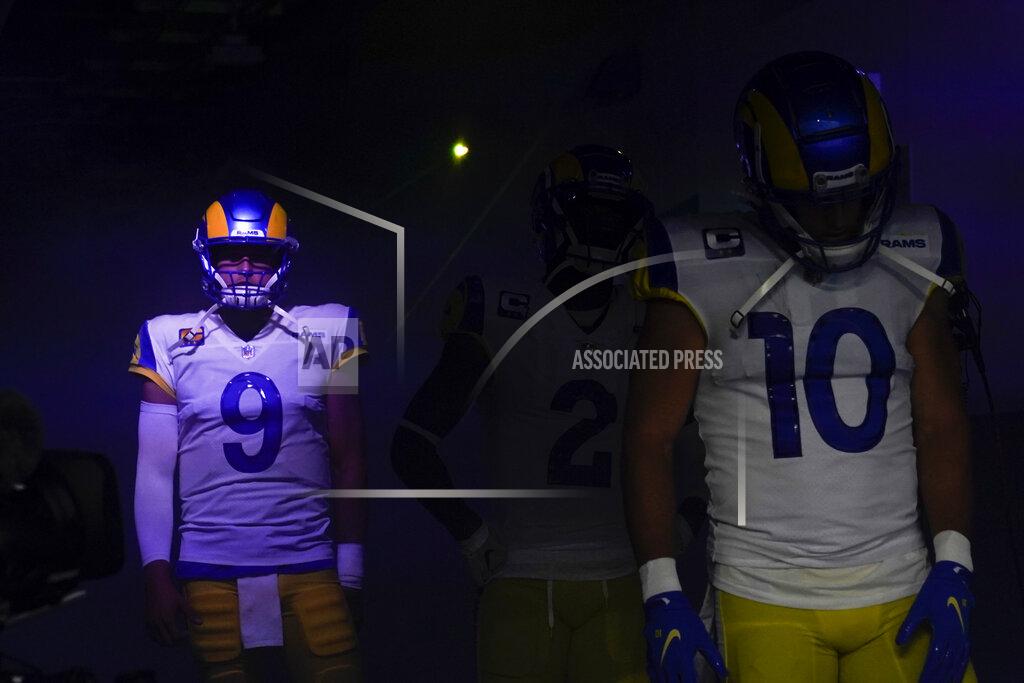 Marcio Jose Sanchez Los Angeles Rams quarterback Matthew Stafford (9) waits alongside wide receiver Cooper Kupp (10) before an NFL football game against the Chicago Bears, Sunday, Sept. 12, 2021, in Inglewood, Calif. (AP Photo/Marcio Jose Sanchez)