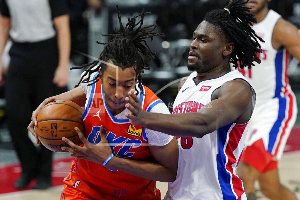 Carlos Osorio Oklahoma City Thunder center Moses Brown is defended by Detroit Pistons center Isaiah Stewart (28) during the first half of an NBA basketball game, Friday, April 16, 2021, in Detroit. (AP Photo/Carlos Osorio)