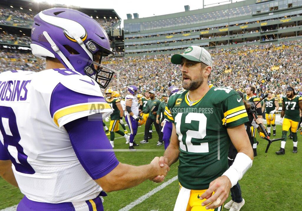 Mike Roemer Green Bay Packers' Aaron Rodgers talks to Minnesota Vikings' Kirk Cousins after an NFL football game Sunday, Sept. 15, 2019, in Green Bay, Wis. The Packers won 21-16. (AP Photo/Mike Roemer)