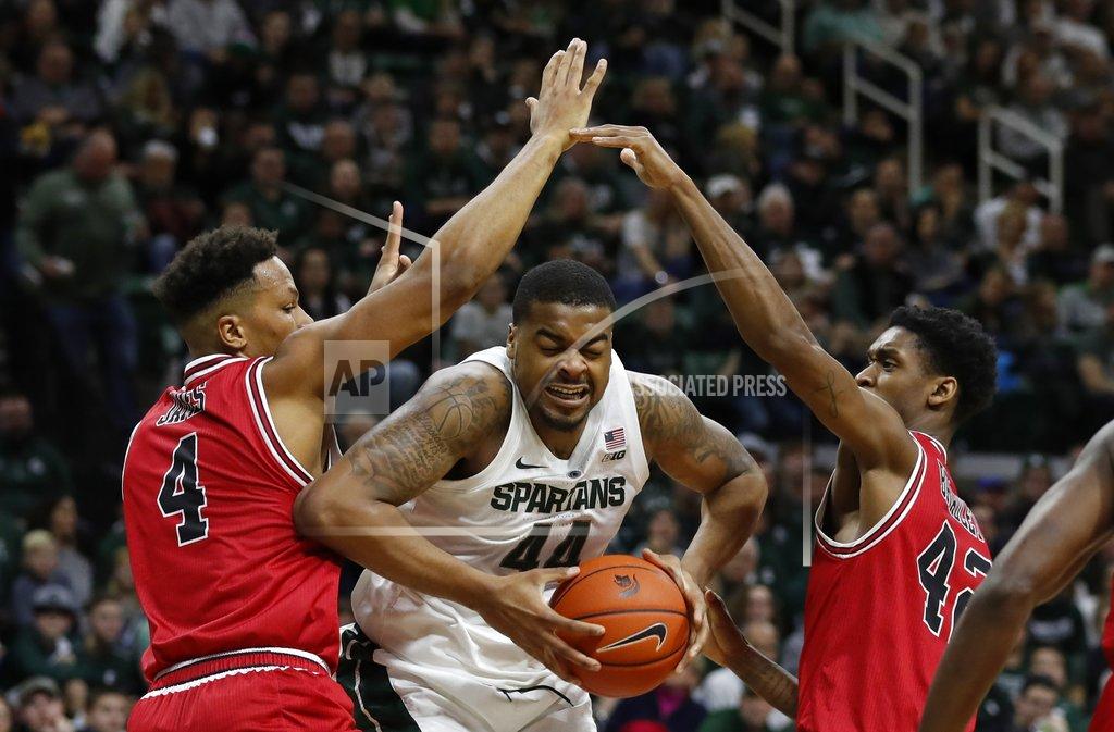 Carlos Osorio Michigan State forward Nick Ward (44) is double teamed by Northern Illinois forwards Lacey James (4) and Levi Bradley (42) during the second half of an NCAA college basketball game, Saturday, Dec. 29, 2018, in East Lansing, Mich. (AP Photo/Carlos Osorio)