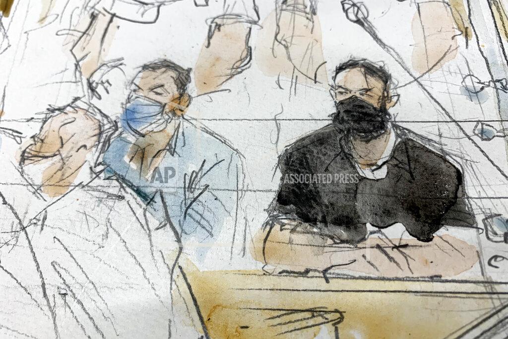 Noelle Herrenschmidt FILE - Sept.8, 2021 file sketch shows key defendant Salah Abdeslam, right, and Mohammed Abrini in the special courtroom built for the 2015 attacks trial. The key defendant in the 2015 Paris attacks trial said Wednesday that the Islamic State network which struck the city was attacking France, and that the deaths of 130 people was "nothing personal." Wearing all black and declining to remove his black mask, Salah Abdeslam was the last of the 14 defendants present in the custom-built courtroom to speak. (Noelle Herrenschmidt via AP, File)