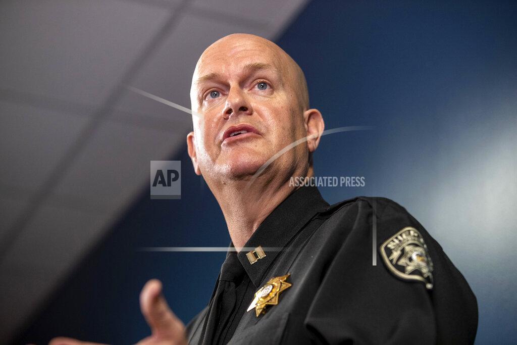 Alyssa Pointer Captain Jay Baker, of the Cherokee County Sheriff's Office, speaks about the arrest of Robert Aaron Long during a press conference at the Atlanta Police Department headquarters in Atlanta, Wednesday, March 17, 2021. Long is accused of killing multiple people, most of whom were of Asian descent, at massage parlors in the Atlanta area. (Alyssa Pointer/Atlanta Journal-Constitution via AP)