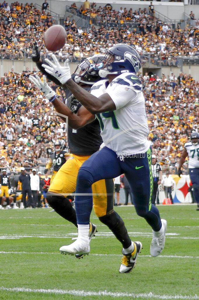 Don Wright Seattle Seahawks wide receiver D.K. Metcalf (14) makes a catch past Pittsburgh Steelers strong safety Terrell Edmunds, left, for a touchdown in the second half of an NFL football game Sunday, Sept. 15, 2019, in Pittsburgh. The play was reviewed and let stand as a touchdown. (AP Photo/Don Wright)