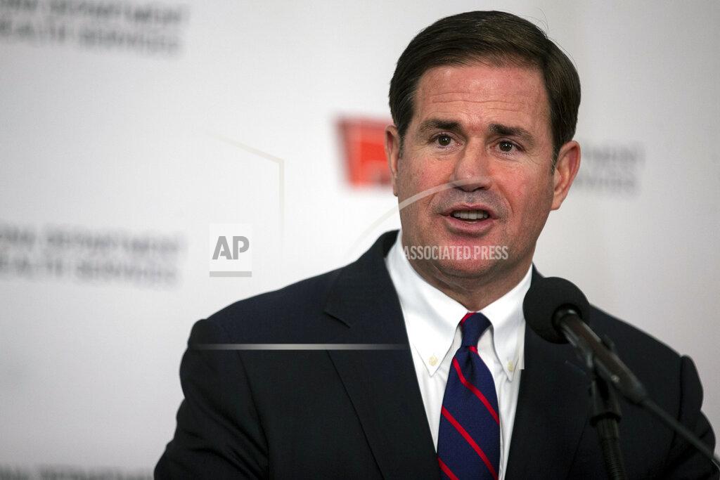 Sean Logan Gov. Doug Ducey speaks during a press conference regarding the COVID-19 pandemic, Thursday, Aug. 13, 2020, at the Arizona Department of Health Services in Phoenix. (Sean Logan/The Arizona Republic via AP)