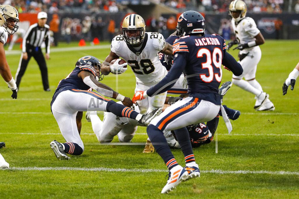 Charles Rex Arbogast New Orleans Saints running back Latavius Murray (28) dives in for a touchdown between Chicago Bears inside linebacker Danny Trevathan (59) and free safety Eddie Jackson (39) during the second half of an NFL football game in Chicago, Sunday, Oct. 20, 2019. (AP Photo/Charles Rex Arbogast)