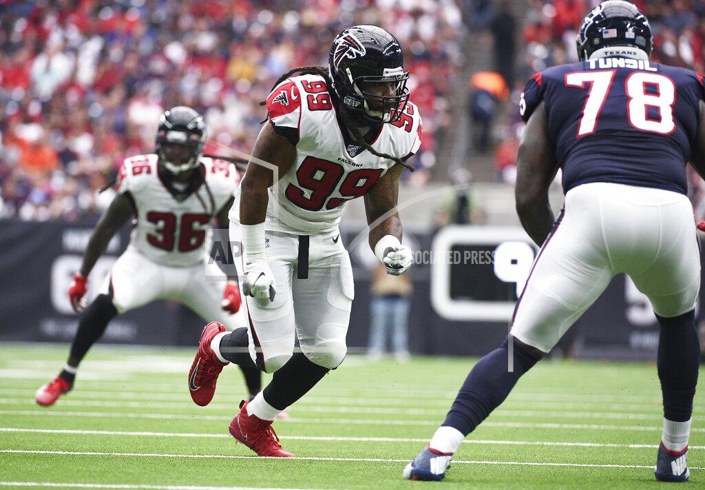 FILE - In this Oct. 6, 2019, file photo, Atlanta Falcons defensive end Adrian Clayborn (99) rushes against the Houston Texans during the first half of an NFL football game in Houston. The Cleveland Browns plan to sign veteran free agent Clayborn to a two-year, $6 million contract, a person familiar with the negotiations told The Associated Press on Tuesday, March 31, 2020. (AP Photo/Eric Christian Smith, File)