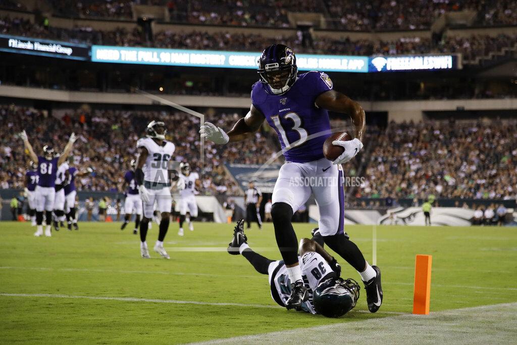 Matt Rourke Baltimore Ravens' Michael Floyd (13) scores a touchdown past Philadelphia Eagles' Jeremiah McKinnon (38) during the first half of a preseason NFL football game, Thursday, Aug. 22, 2019, in Philadelphia. (AP Photo/Matt Rourke)