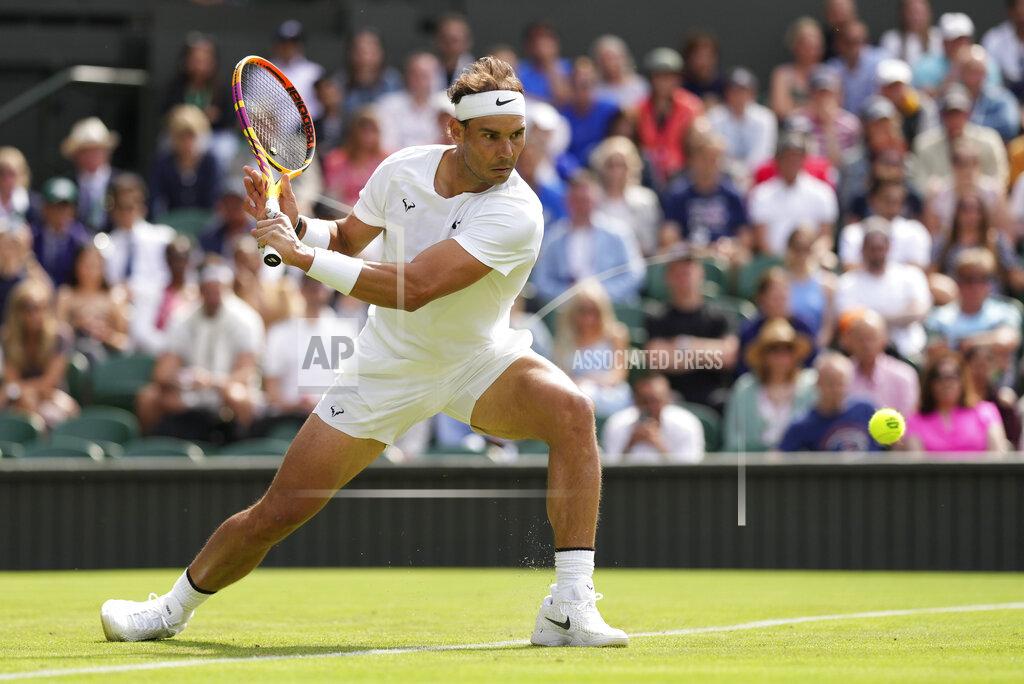 Alberto Pezzali Spain's Rafael Nadal returns to Argentina's Francisco Cerundolo in a first round men's singles match on day two of the Wimbledon tennis championships in London, Tuesday, June 28, 2022. (AP Photo/Alberto Pezzali)