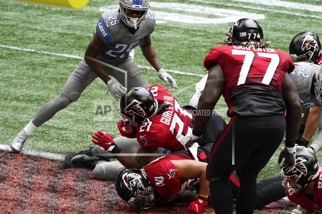 John Bazemore Atlanta Falcons running back Todd Gurley (21) falls into the end zone for a touchdown against the Detroit Lions during the first half of an NFL football game, Sunday, Oct. 25, 2020, in Atlanta. (AP Photo/John Bazemore)