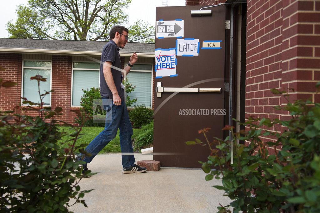 Kenneth Ferriera A voter makes their way into their precinct's polling location at American Lutheran Church on Tuesday, May 10, 2022, in Lincoln, Neb. Nebraska Republicans will pick a nominee for governor Tuesday in a bitter primary race that was upended in recent weeks after a leading candidate endorsed by former President Donald Trump was accused of groping at least eight women over the last few years. (Kenneth Ferriera/Lincoln Journal Star via AP)