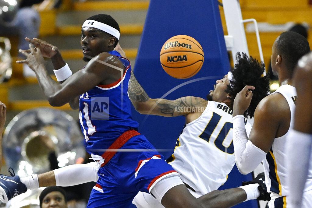 Mark Zaleski Tennessee State forward Kassim Nicholson (11) and Murray State guard Tevin Brown (10) battle for the ball during the first half of an NCAA college basketball game Thursday, Feb. 10, 2022, in Nashville, Tenn. (AP Photo/Mark Zaleski)
