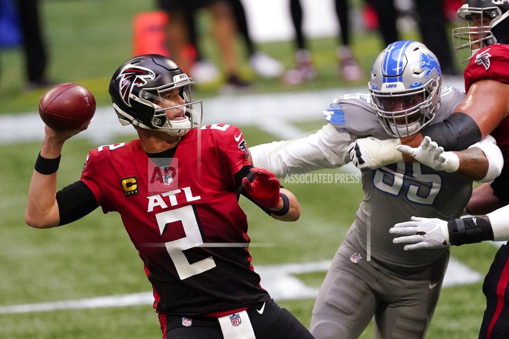 John Bazemore Atlanta Falcons quarterback Matt Ryan (2) works as Detroit Lions defensive end Romeo Okwara (95) pressures during the first half of an NFL football game, Sunday, Oct. 25, 2020, in Atlanta. (AP Photo/John Bazemore)