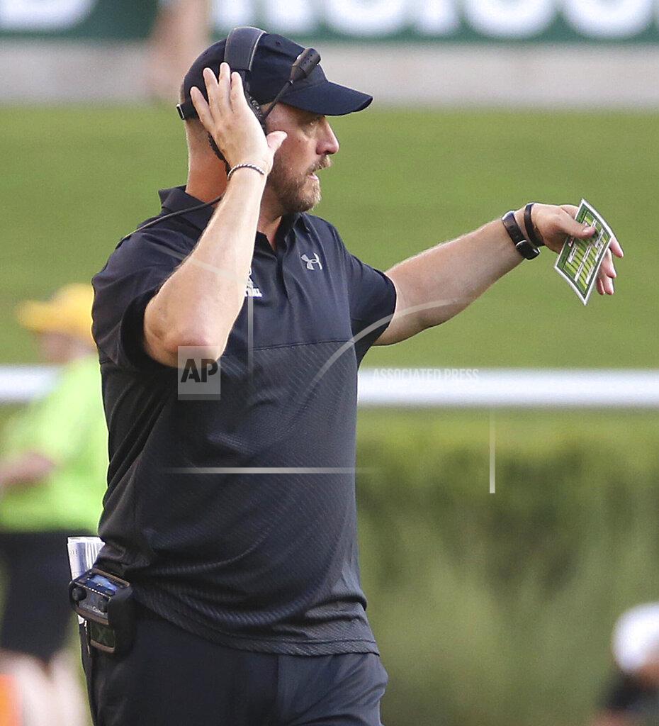 Jerry Larson Stephen F. Austin head coach Colby Carthel calls a play to his team in an NCAA college football game against Baylor in the first half Saturday, Aug. 31, 2019, in Waco, Texas. (Jerry Larson/Waco Tribune-Herald via AP)