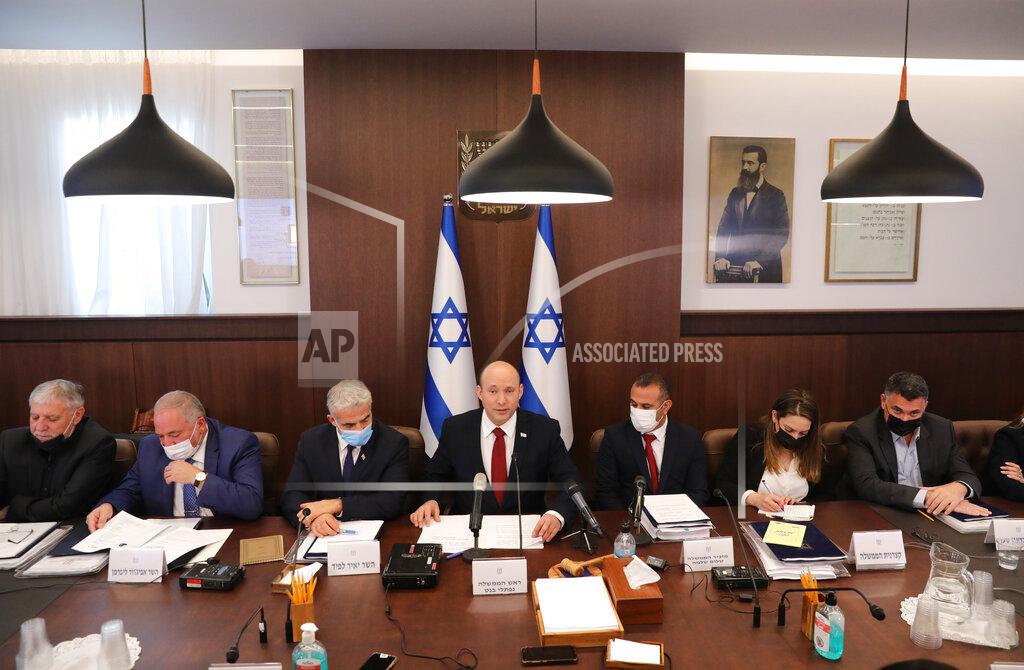 Abir Sultan Israeli Prime Minister Naftali Bennett attends a cabinet meeting at his office in Jerusalem, Sunday, Aug. 1, 2021. (Abir Sultan/Pool Photo via AP)