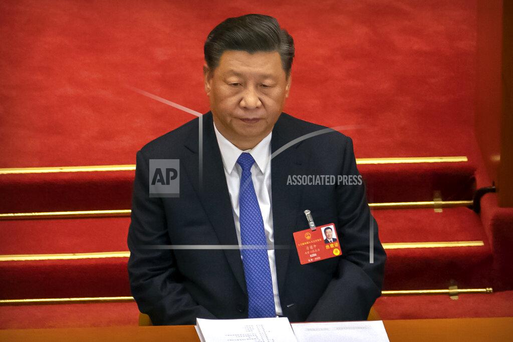 Chinese President Xi Jinping attends the closing session of China's National People's Congress (NPC) in Beijing, Thursday, May 28, 2020. China's ceremonial legislature has endorsed a national security law for Hong Kong that has strained relations with the United States and Britain. (AP Photo/Mark Schiefelbein)
