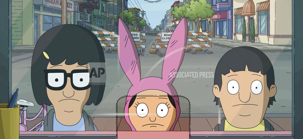 Uncredited This image released by 20th Century Studios shows, from left, Tina Belcher, voiced by Dan Mintz, Louise Belcher, voiced by Kristen Schaal, and Gene Belcher, voiced by Eugene Mirman, in a scene from "The Bob's Burgers Movie." (20th Century Studios via AP)