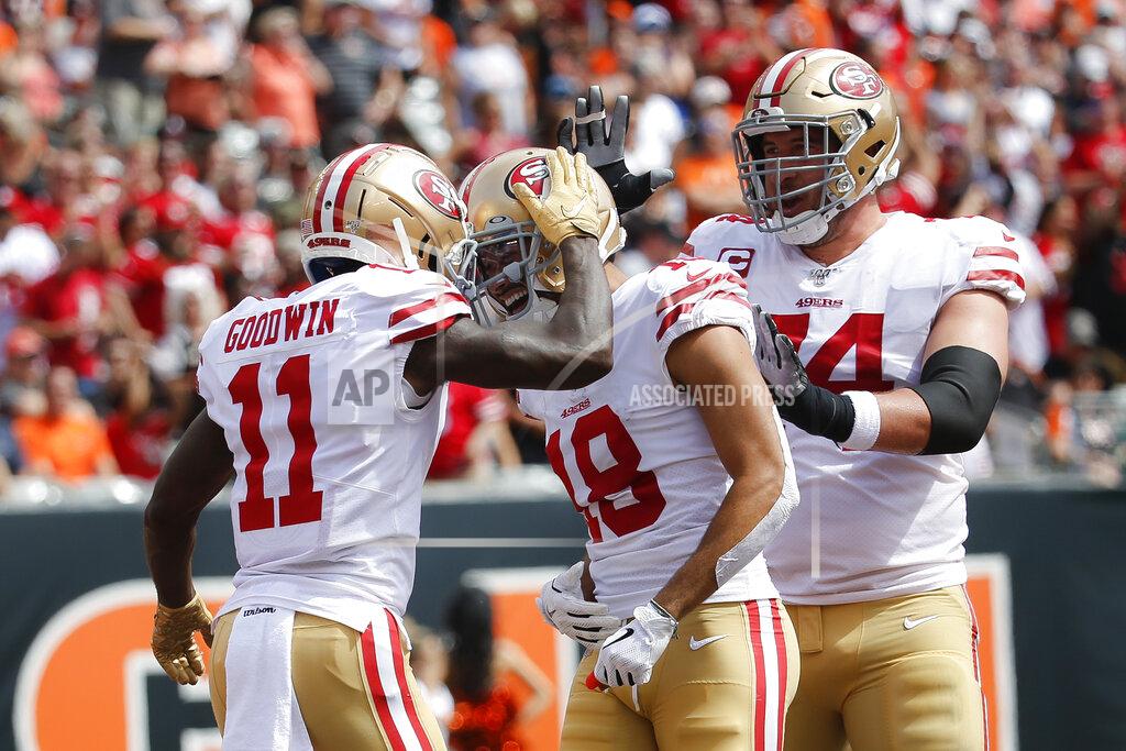 Frank Victores San Francisco 49ers wide receiver Marquise Goodwin (11) celebrates his touchdown with wide receiver Dante Pettis (18) during the first half an NFL football game against the Cincinnati Bengals, Sunday, Sept. 15, 2019, in Cincinnati. (AP Photo/Frank Victores)