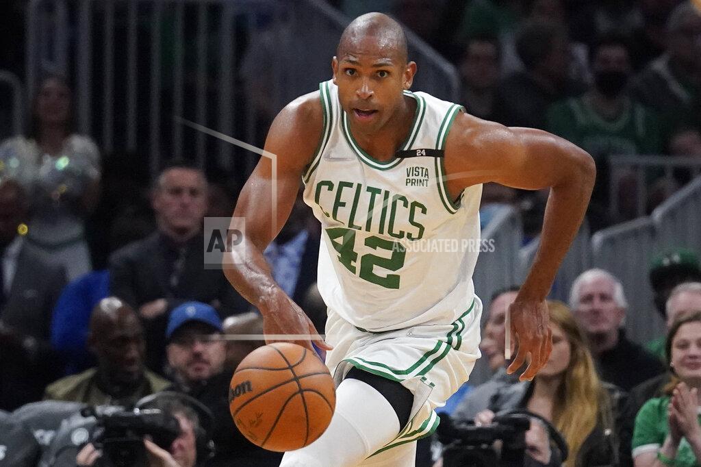 Charles Krupa Boston Celtics center Al Horford (42) dribbles downcourt during the second half of Game 4 of the NBA basketball playoffs Eastern Conference finals against the Miami Heat, Monday, May 23, 2022, in Boston. (AP Photo/Charles Krupa)