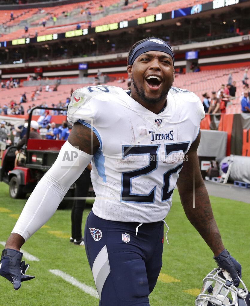 Ron Schwane Tennessee Titans running back Derrick Henry celebrates after the Titans defeated the Cleveland Browns 43-13 in an NFL football game, Sunday, Sept. 8, 2019, in Cleveland. (AP Photo/Ron Schwane)
