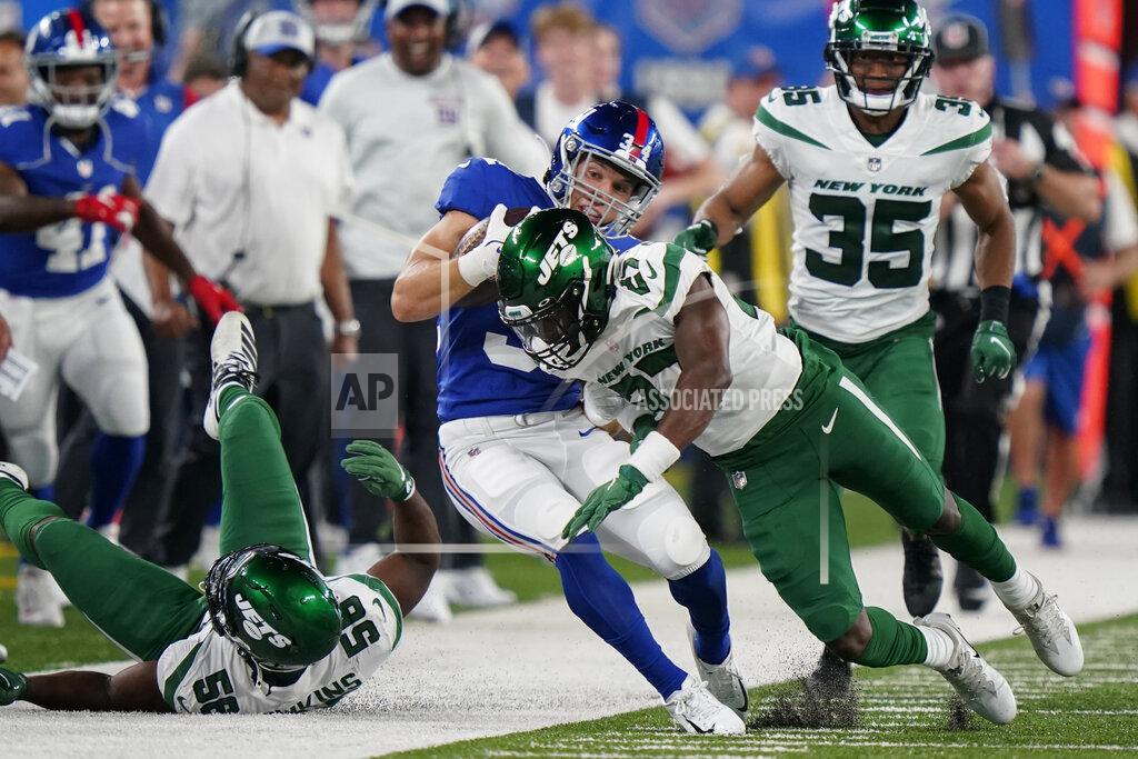 Corey Sipkin New York Giants running back Sandro Platzgummer (34) runs the ball against New York Jets defensive back Corey Ballentine (27) in the second half of an NFL preseason football game, Saturday, Aug. 14, 2021, in East Rutherford, N.J. (AP Photo/Corey Sipkin)