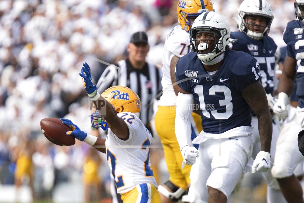 Barry Reeger Penn State linebacker Ellis Brooks (13) celebrates after stopping Pittsburgh running back Vincent Davis (22) in the second half of an NCAA college football game in State College, Pa., on Saturday, Sept. 14, 2019. (AP Photo/Barry Reeger)
