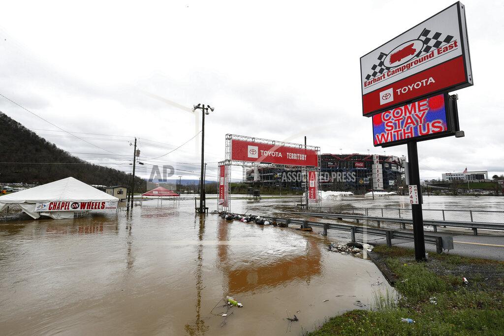 Wade Payne Water floods the vendor area as races for both the Truck Series and NASCAR Cup Series auto race were postponed due to inclement weather at Bristol Motor Speedway, Sunday, March 28, 2021, in Bristol, Tenn. (AP Photo/Wade Payne)