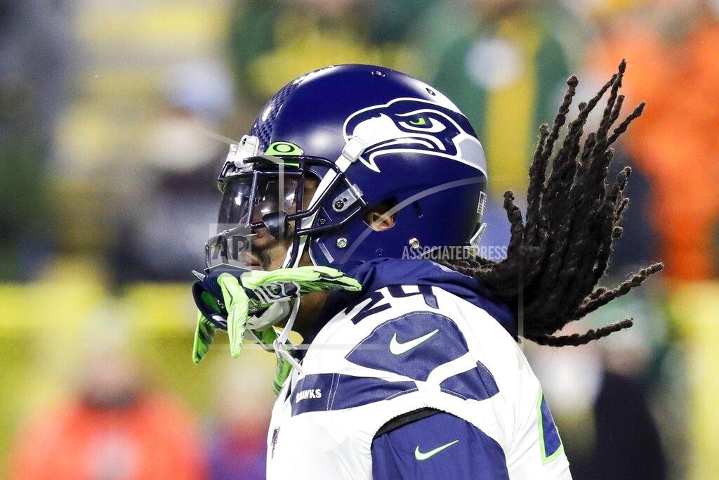 Darron Cummings Seattle Seahawks' Marshawn Lynch warms up before an NFL divisional playoff football game against the Green Bay Packers Sunday, Jan. 12, 2020, in Green Bay, Wis. (AP Photo/Darron Cummings)