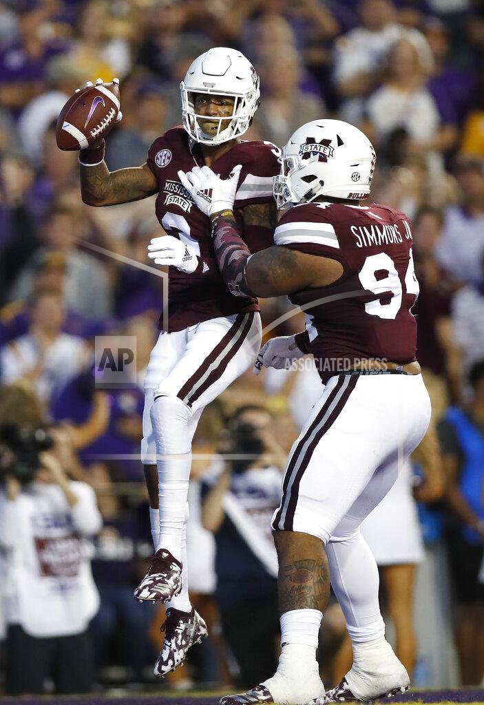 Tyler Kaufman Mississippi State cornerback Cameron Dantzler (3) reacts with defensive tackle Jeffery Simmons (94) after intercepting the ball during an NCAA college football game against LSU in Baton Rouge, La., Saturday, Oct. 20, 2018. (AP Photo/Tyler Kaufman)