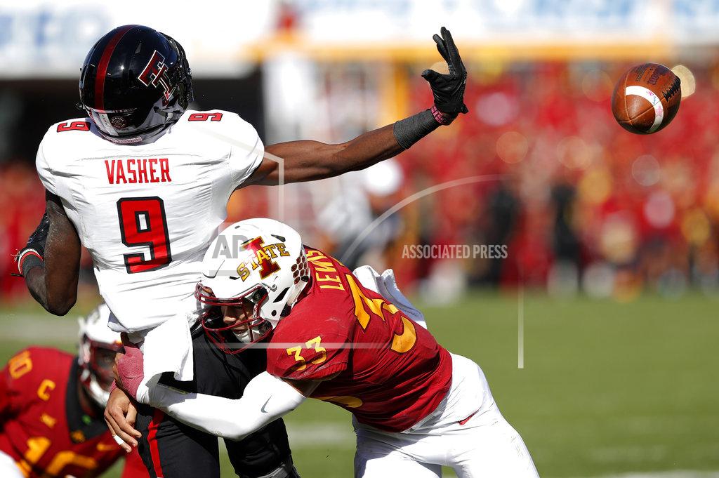Charlie Neibergall Iowa State defensive back Braxton Lewis (33) breaks up a pass intended for Texas Tech wide receiver T.J. Vasher (9) during the second half of an NCAA college football game, Saturday, Oct. 27, 2018, in Ames, Iowa. (AP Photo/Charlie Neibergall)
