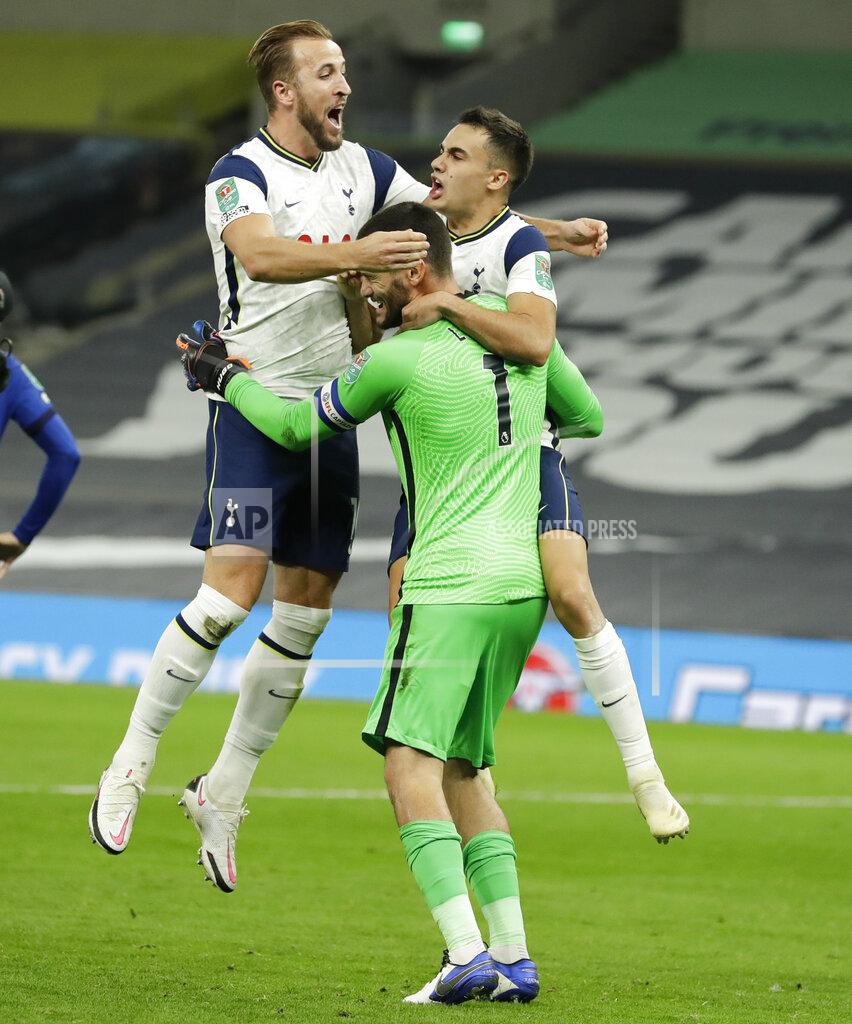 Matt Dunham Tottenham's Harry Kane, left, and Danny Rose congratulate Tottenham's goalkeeper Hugo Lloris during the English League Cup fourth round soccer match between Tottenham Hotspur and Chelsea at Tottenham Hotspur Stadium in London, England, Tuesday, Sept. 29, 2020.Tottenham defeated Chelsea 5-4 on penalties. (Matt Dunham/Pool via AP)