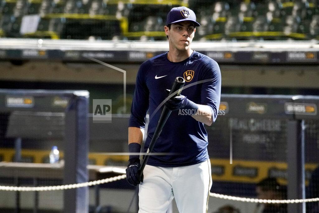 Morry Gash FILE - In this Monday, July 6, 2020, file photo, Milwaukee Brewers' Christian Yelich waits to hit during baseball practice at Miller Park in Milwaukee. (AP Photo/Morry Gash, File)