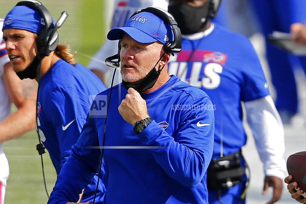 Jeffrey T. Barnes FILE - In this Sept. 13, 2020 file photo, Buffalo Bills head coach Sean McDermott pulls his mask down to give instructions on the sidelines during the second half of an NFL football game against the New York Jets in Orchard Park, N.Y. McDermott pays credit to experiences and advice he gained working under Kansas City coach Andy Reid, while the two were in Philadelphia, including getting fired by Reid in 2010, which McDermott says was the best thing to happen to his career. (AP Photo/Jeffrey T. Barnes, File)