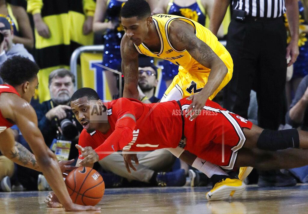 Carlos Osorio Ohio State guard Luther Muhammad (1) reaches for a loose ball during the first half of the team's NCAA college basketball game against Michigan, Tuesday, Jan. 29, 2019, in Ann Arbor, Mich. (AP Photo/Carlos Osorio)