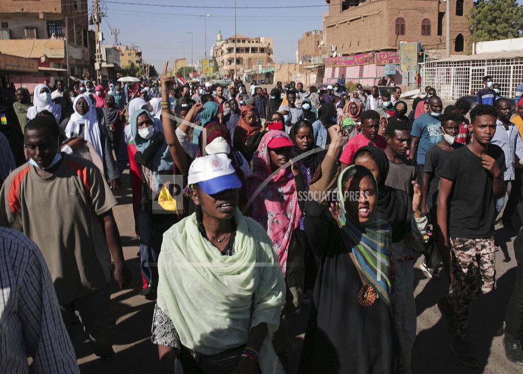 Marwan Ali Thousands of protesters take to the streets to renew their demand for a civilian government in the Sudanese capital Khartoum, Thursday, Nov. 25, 2021. The rallies came just days after the military signed a power-sharing deal with the prime minister, after releasing him from house arrest and reinstating him as head of government. The deal came almost a month after the generals orchestrated a coup. Sudan’s key pro-democracy groups and political parties have dismissed the deal as falling short of their demands for a fully civilian rule. (AP Photo/Marwan Ali)