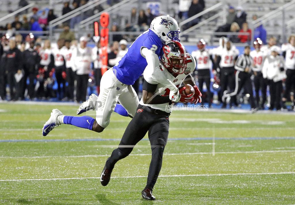 Mark Humphrey Western Kentucky wide receiver Lucky Jackson (11) catches a 46-yard touchdown pass as he is defended by Middle Tennessee's Chris Stamps (2) during the second half of an NCAA college football game Friday, Nov. 2, 2018, in Murfreesboro, Tenn. Middle Tennessee won 29-10. (AP Photo/Mark Humphrey)