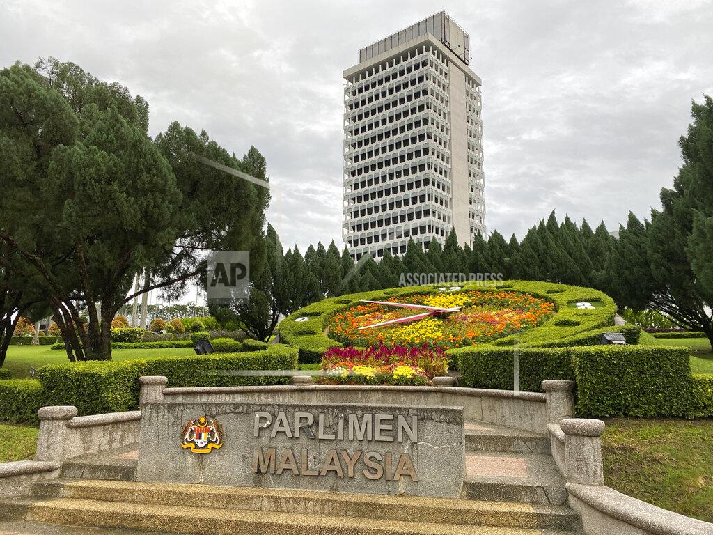 Vincent Thian Malaysia's lower house parliament building is seen in Kuala Lumpur, Malaysia, Monday, July 13, 2020. Malaysian new Prime Minister Muhyiddin Yassin narrowly won a motion to boot the parliament speaker Monday, scraping through the first test of his support nearly five months after he took power. (AP Photo/Vincent Thian)