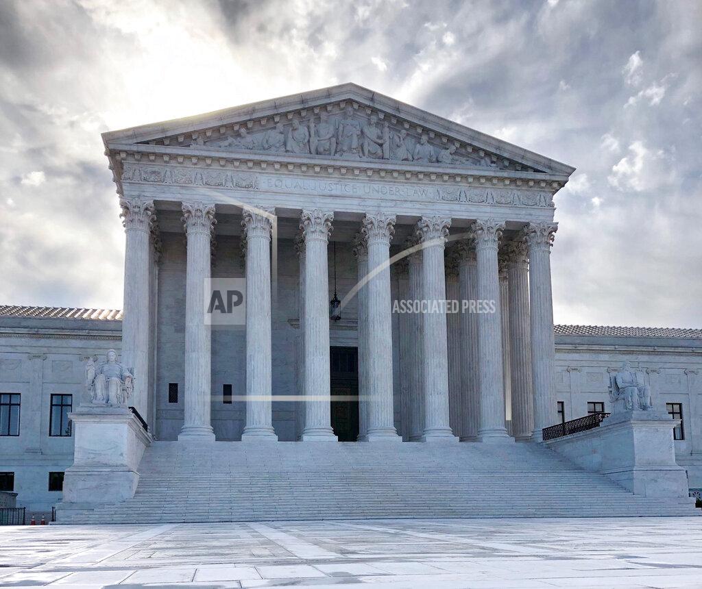 The rising sun shines over the Supreme Court building on Capitol Hill in Washington, Monday morning, May 11, 2020. (AP Photos/Mark Sherman)