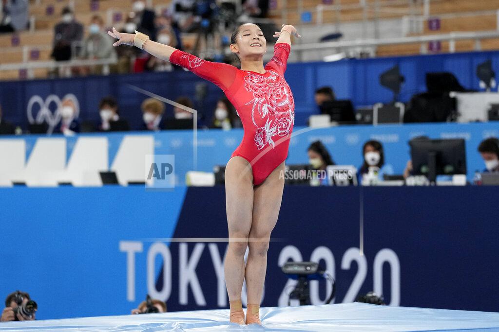 Ashley Landis Tang Xijing, of China, performs on the balance beam during the artistic gymnastics women's apparatus final at the 2020 Summer Olympics, Tuesday, Aug. 3, 2021, in Tokyo, Japan. (AP Photo/Ashley Landis)