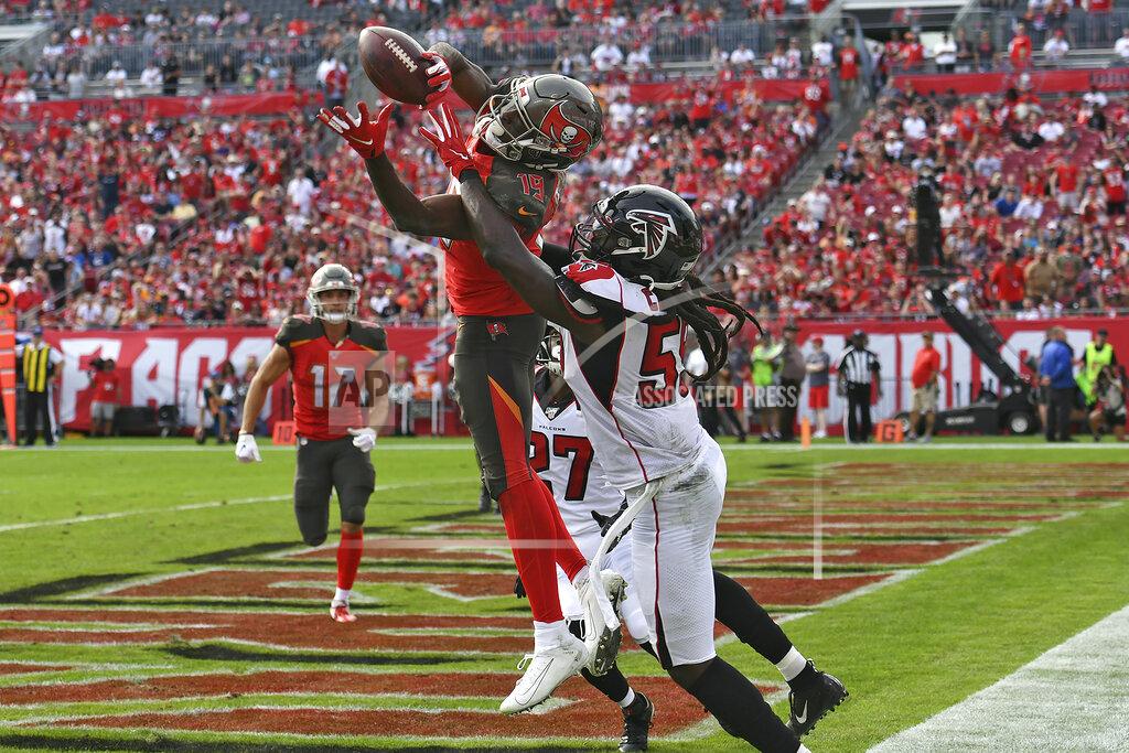Jason Behnken Tampa Bay Buccaneers wide receiver Breshad Perriman (19) pulls in a 24-yard touchdown reception in front of Atlanta Falcons outside linebacker De'Vondre Campbell (59) during the first half of an NFL football game Sunday, Dec. 29, 2019, in Tampa, Fla. (AP Photo/Jason Behnken)