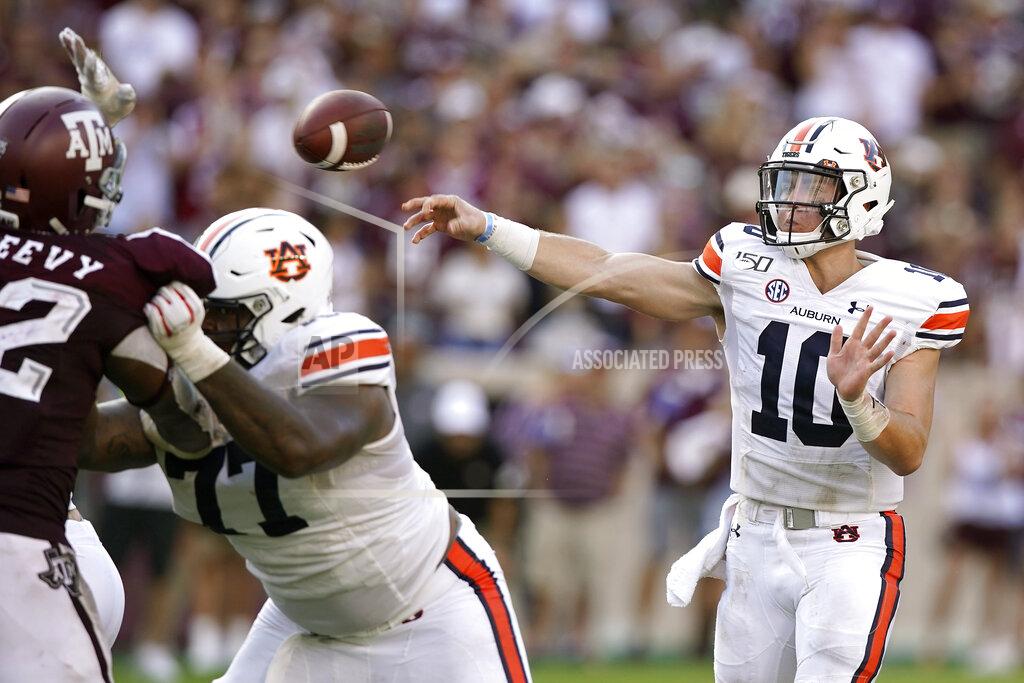 Sam Craft Auburn quarterback Bo Nix (10) passes down field against Texas A&M during the second half of an NCAA college football game, Saturday, Sept. 21, 2019, in College Station, Texas. (AP Photo/Sam Craft)