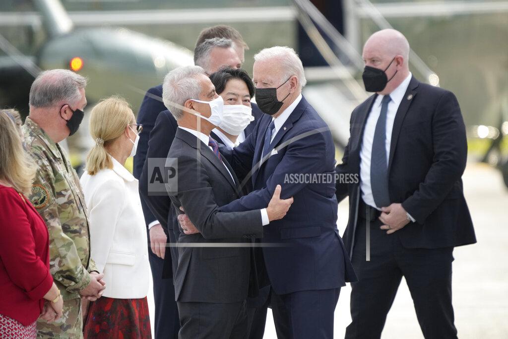 Eugene Hoshiko U.S. President Joe Biden is greeted by Rahm Emanuel, U.S. Ambassador to Japan upon his arrival at the U.S. Yokota Air Base, in Fussa on the outskirts of Tokyo, Sunday, May 22, 2022. (AP Photo/Eugene Hoshiko)
