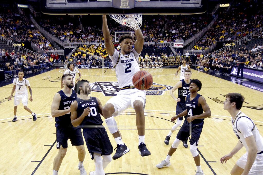 Charlie Riedel Missouri forward Tray Jackson (2) dunks during the first half of an NCAA college basketball game against Butler, Monday, Nov. 25, 2019, in Kansas City, Mo. (AP Photo/Charlie Riedel)