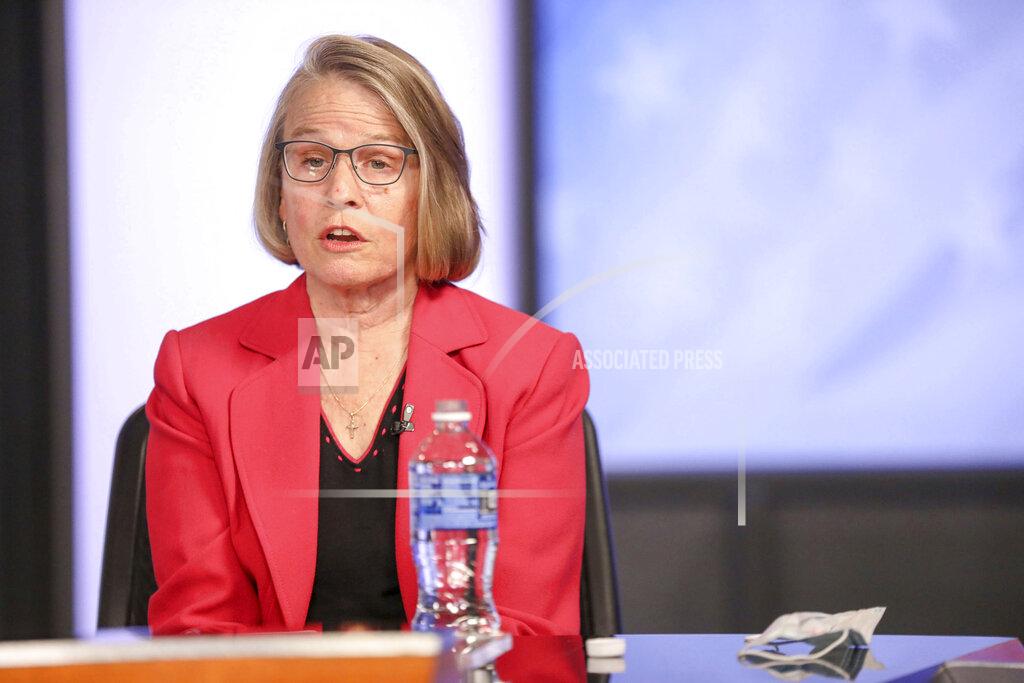 Rebecca F. Miller FILE - In this Oct. 8, 2020 file photo, Mariannette Miller-Meeks answers a question during a debate with Rita Hart in Cedar Rapids, Iowa. Republican Miller-Meeks is running in the Nov. 3, 2020, general election for the congressional seat left open by the retirement of longtime Democratic Rep. Dave Loebsack, of Iowa City. (Rebecca F. Miller/The Gazette via AP, File)